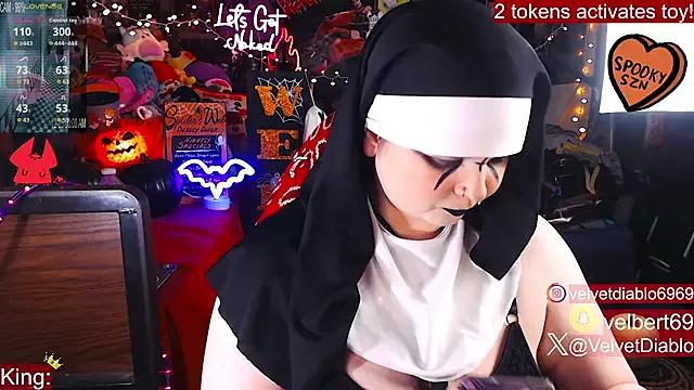 StripChat VelvetDiablo is Freechat VelvetDiablo — Bodysuit off, completely naked nun!